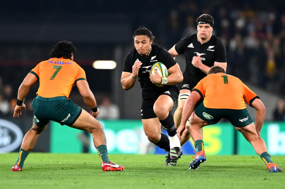 Caleb Clarke of the All Blacks charges forward.