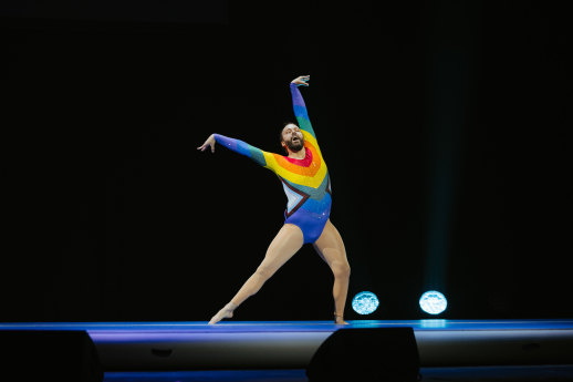 JVN shows off his gymnastics skills on stage.