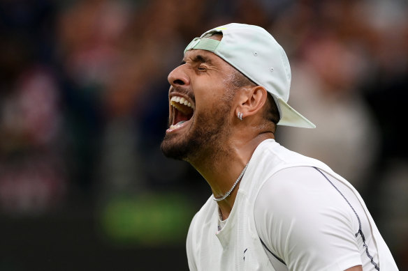 Nick Kyrgios of Australia celebrates winning against Stefanos Tsitsipas of Greece during their Men’s Singles Third Round match on day six of The Championships Wimbledon 2022.