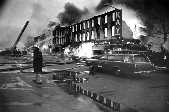 On H Street, Washington, DC, only storefronts remain standing, April 1968.