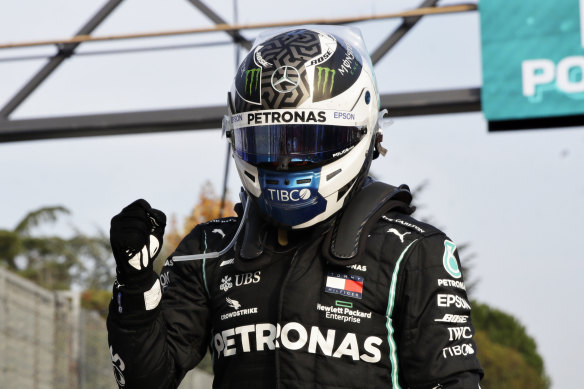 Valtteri Bottas celebrates taking pole at Imola.