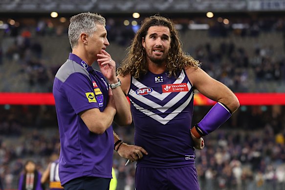 Fremantle coach Justin Longmuir speaks to Pearce after the team’s disappointing finals clash with Hawthorn.