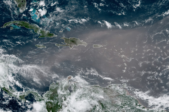 This satellite photo shows a cloud of dust coming from the Sahara desert stretching across the Caribbean.