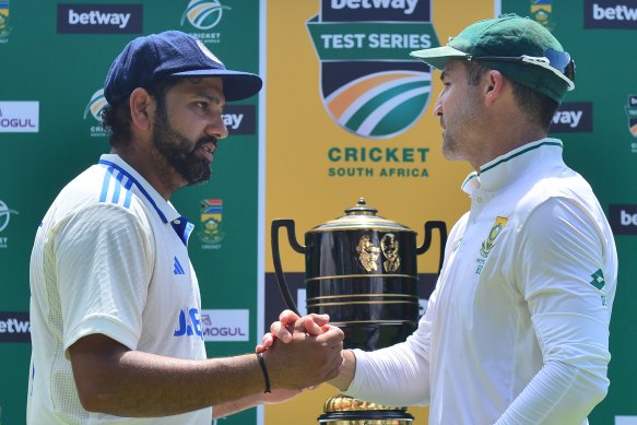 Rohit Sharma and Dean Elgar shake hands after the India-South Africa match, the latter’s last in Test cricket.