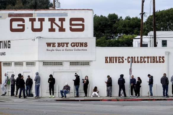 People wait in line to enter a gun store in Culver City, California during the rush on guns earlier this month.