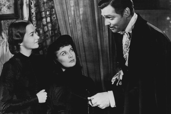 Olivia De Havilland, Vivien Leigh and Clark Gable in Gone With The Wind.