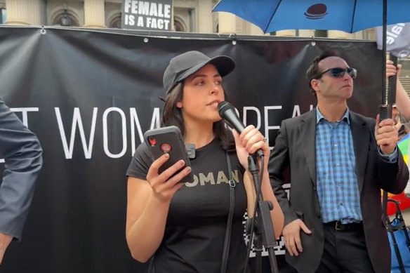 Moira Deeming speaking at an anti-trans rights rally at Parliament House on Saturday.