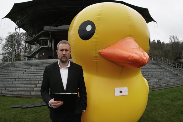 Alex Horne on the set of the show he created, Taskmaster.