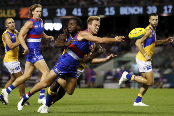 Mitch Wallis is tackled by Nic Naitanui last week.