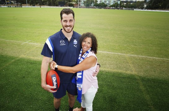 Family pride: North Melbourne player Tristan Xerri and his mum, Lydia Xerri, at the Kangaroos’ Arden Street oval.