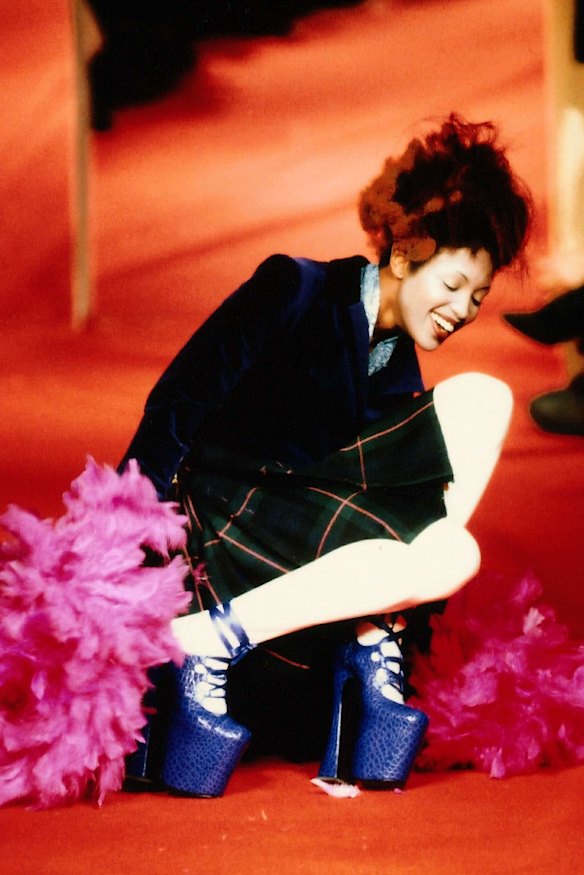 Naomi Campbell falling on the Vivienne Westwood runway in 1993. The photo appeared in The Vivienne Westwood: 34 Years in Fashion exhibition held at the National Gallery of Australia in 2005.