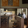 Sporting memorabilia is part of the old-school charm in the design.
