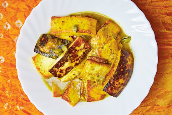 Cardamom and cloves are used to finish this turmeric chaaman dish.