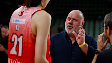 Craig Hutchison, owner of the Perth Lynx, speaks to player Han Xu in January 2026.
