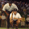 Tiger Woods and Annika Sorenstam playing golf under lights in 2001.