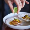 Baked scallops with miso butter and corn at The Herring Room.
