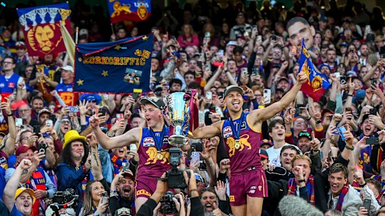 Lion power: Brisbane’s Logan Morris and Kai Lohmann enjoy the moment.