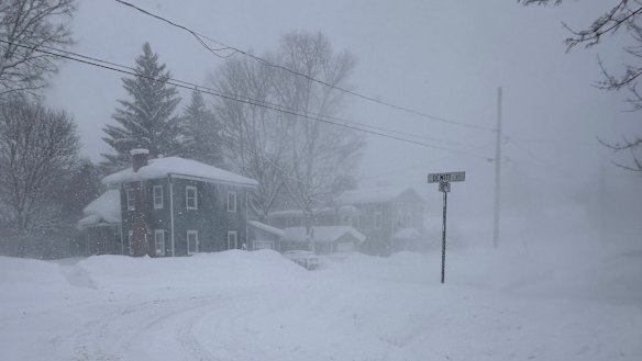 Strong winds kick up snow in Lowville, New York, on Friday