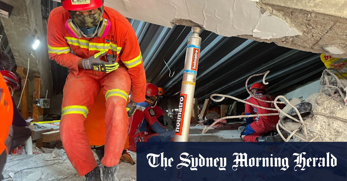 Rescuers search for 91 missing people in rubble of collapsed building