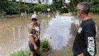 Parts of Brisbane flooded in the 2022 deluge, with insurers’ responses facing an inquiry.