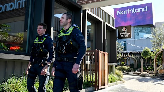 Police patrol Northland shopping center in Preston the day after a brutal machete fight forced bystanders to intervene.