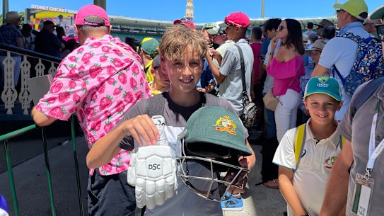 Brody Quin, 12, was lucky enough to come away with David Warner’s final Test with the opener’s helmet and gloves.