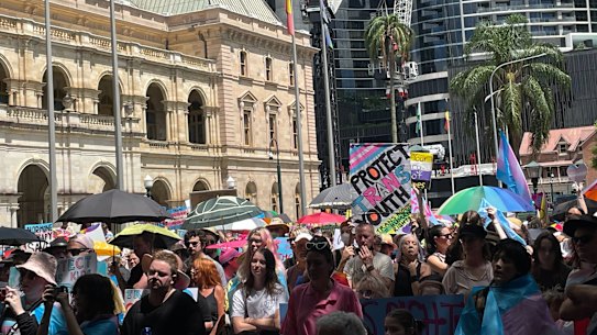 Protesters gathered outside Parliament House at a rally calling for the LNP to reinstate healthcare for trans youth in Brisbane on February 8. 