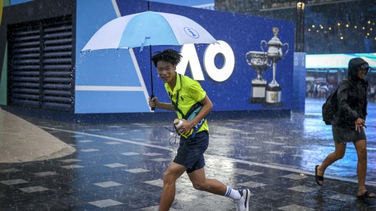 The rain sends people running for cover.