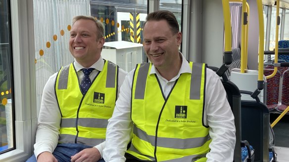 Miles and Schrinner are all smiles after announcing the state government will boost its share of bus funding.