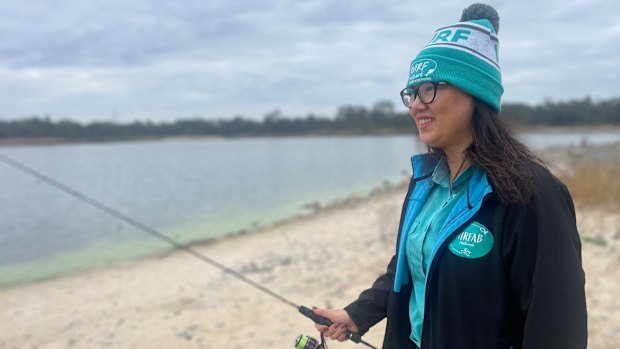 Leanne Ngo is a member of Women in Recreational Fishing and is excited about the thousands of fish being released before the school holidays. 
