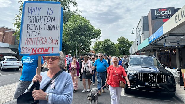 Susan McMillan, a Brighton resident of 44 years, protesting against plans to increase density in the bayside suburb.
