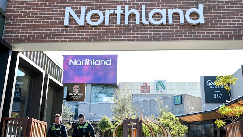 Man on the run after driving through Melbourne shopping centre