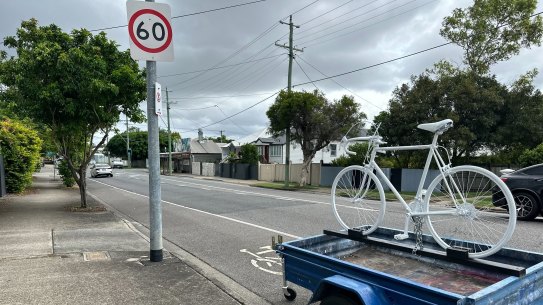 The ghost bike memorial on Nudgee Road at Hendra has reappeared on the back of a legally parked trailer. The ghost was originally left after Philip Pawsey was killed by a truck while riding his bike in May 2023, but was removed by Brisbane City Council six times, as it was deemed a safety hazard.