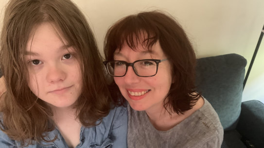 Hugs at last: Herald opinion editor Julie Lewis with daughter Grace, who was freed from COVID isolation on Saturday.