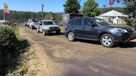 Festivalgoers pack up their tents after Falls Festival in Lorne was cancelled due to extreme weather conditions. 