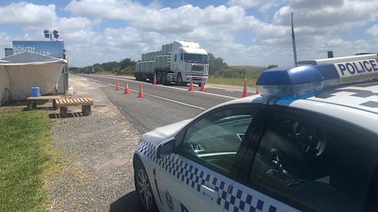 South Australian police at the South Australia-Victoria border near Nelson on Wednesday. 