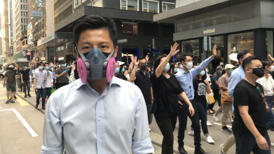 Richard, 29, an engineer, was among the thousands of ordinary office workers to march through central Hong Kong on Friday to protest a government move to invoke emergency powers banning face masks.
