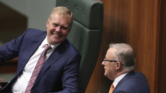 Speaker Tony Smith speaks with Opposition Leader Anthony Albanese during Question Time.