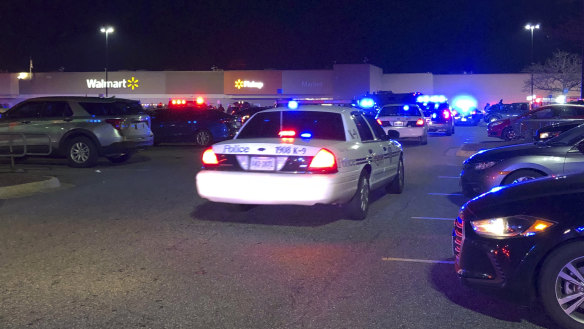 Virginia police respond to the scene of a fatal shooting at a Walmart on Tuesday night.