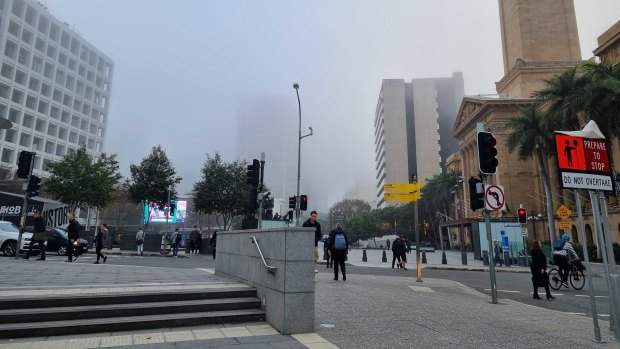 Brisbane hidden under thick fog, drivers warned and flights diverted