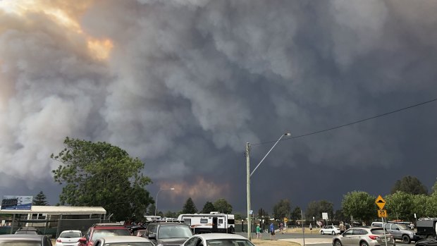 Smoke from nearby bushfires billows across Moruya in January 2019.  