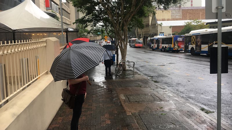 Flooding in Brisbane possible as storms predicted to end heat