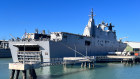 The imposing HMAS Adelaide docked in Townsville.