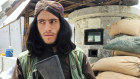 A Taliban fighter stands guard at a checkpoint near the US embassy. America’s default tendency is to see the rest of the world in black and white.