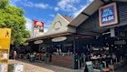 Aldi does not have any stores in Tasmania. The Greens want it to open to boost competition and help lower grocery prices.