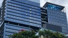 Suncorp’s Brisbane headquarters last week, with its sea-scape light-show ceiling top right. 