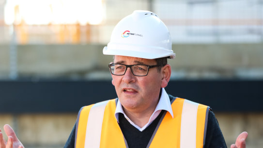 Lock out, not down: Premier Daniel Andrews wants to reduce international arrivals by at least 75 per cent.