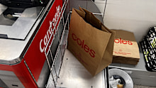 Coles has hiked the price of its paper shopping bags from 25 to 20 cents.