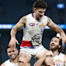 Tom Liberatore of the Bulldogs is chaired from the field after his 250th match by teammates.