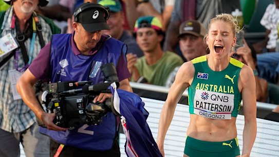 Gold medallist Eleanor Patterson celebrates her victory.